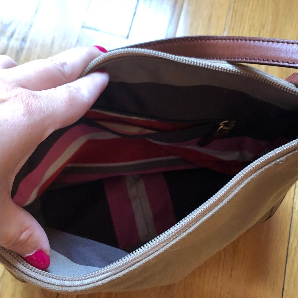 Kate Spade bag Striped interior.Leather bottom.